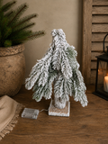 Besneeuwd LED-boompje op houten voet